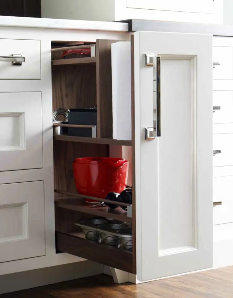 Paper towel holder pullout in a cabinet