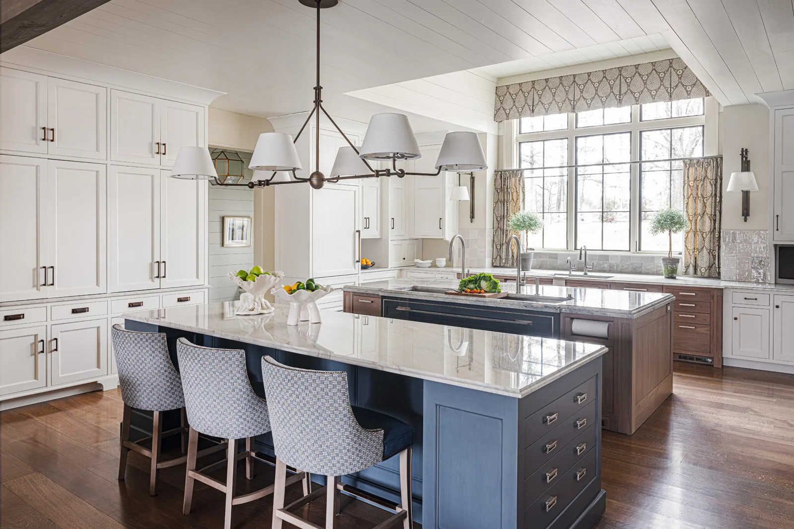 Custom kitchen cabinets with roll out trays, drawer organizers, and elegant finishes
