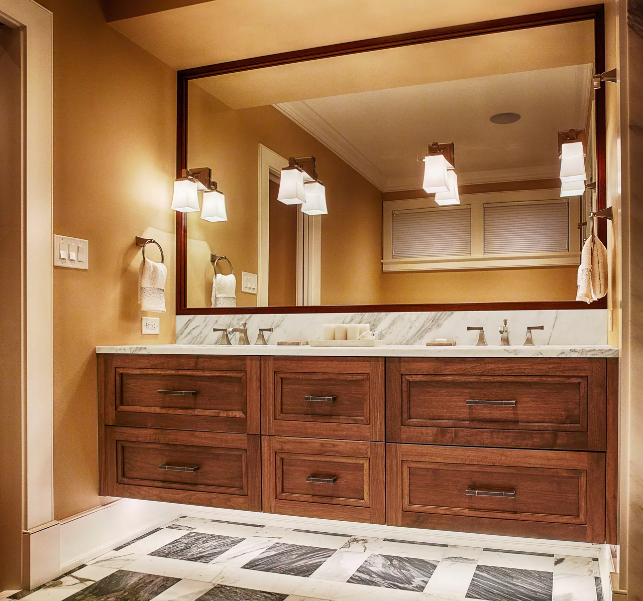 Custom bathroom floating vanity with integrated lighting