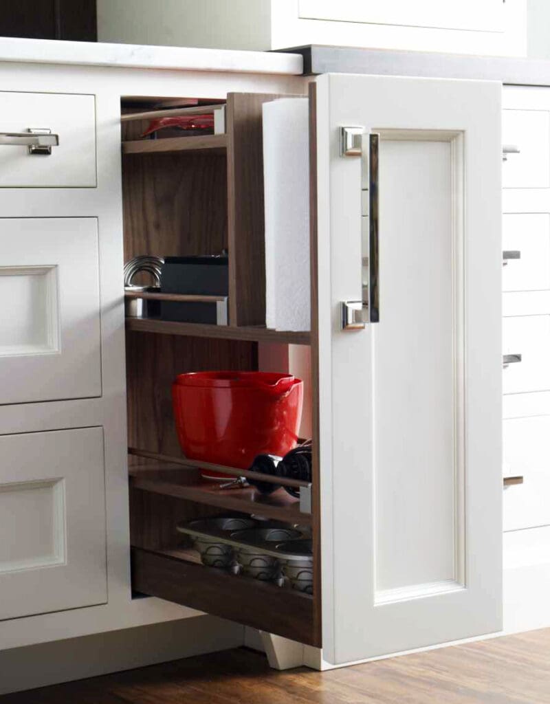 Paper towel holder pullout in a cabinet