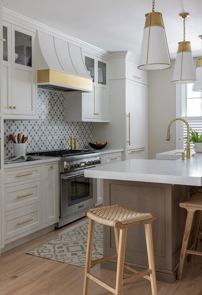 Kitchen island with custom cabinetry and stools